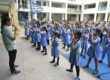 SPUWAC Delhi Police trainer leading a self-defense training session for girl students at Sulabh Public School