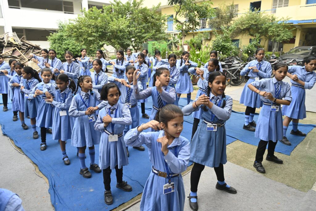 Young Students Learn Self-Defense Techniques Delhi Young girl students learning self-defense techniques at Sulabh Public School, Delhi